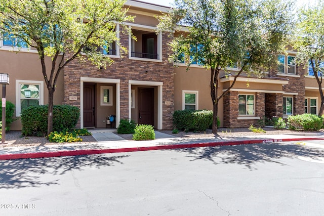 5550 N 16th St Unit 166, Phoenix, AZ 85016 - townhome / multi-family property with stucco siding and stone siding
