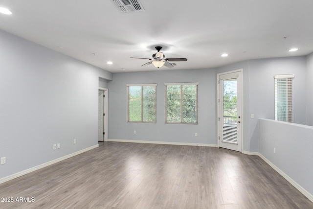 5550 N 16th St Unit 166, Phoenix, AZ 85016 - unfurnished room with recessed lighting, a ceiling fan, and wood finished floors