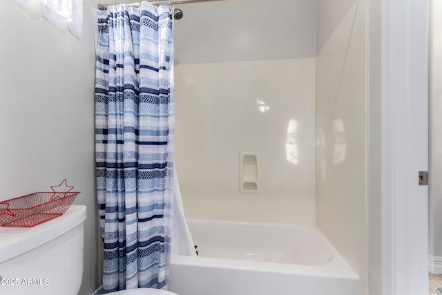 full bathroom with toilet and shower / tub combo with curtain