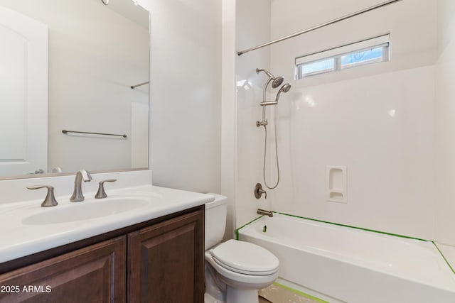 full bath with toilet, vanity, and washtub / shower combination