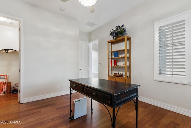 office with wood finished floors, baseboards, and healthy amount of natural light