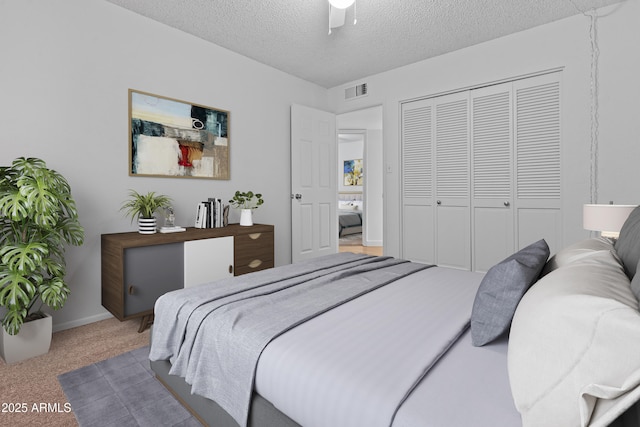 2916 S Revere Cir, Mesa, AZ 85210 - carpeted bedroom with a closet, a textured ceiling, a ceiling fan, and baseboards