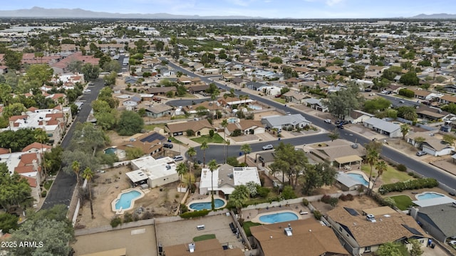2916 S Revere Cir, Mesa, AZ 85210 - aerial view of property and surrounding area featuring a pool area, nearby suburban area, and a mountain backdrop