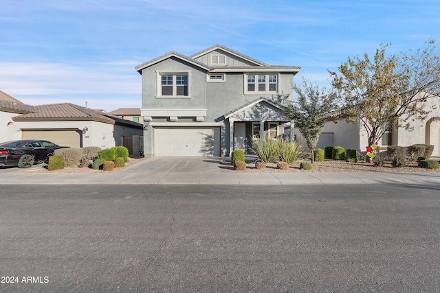 view of front property with a garage