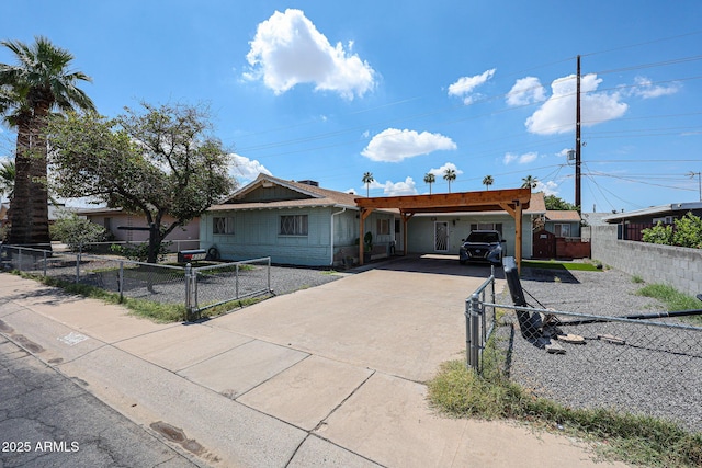 4323 W Rose Ln, Glendale, AZ 85301 - ranch-style home featuring driveway, a gate, and an attached carport