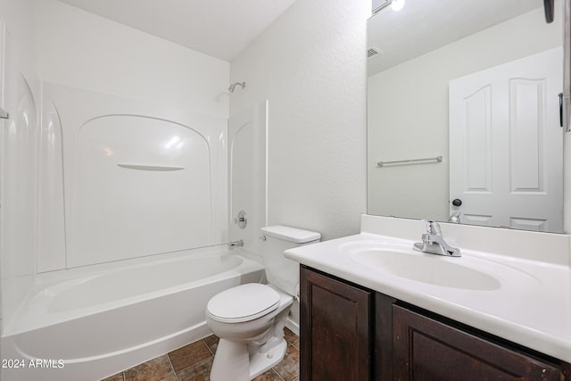 full bathroom featuring vanity, toilet, washtub / shower combination, and tile patterned floors