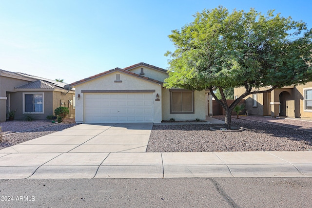 view of front of home with a garage