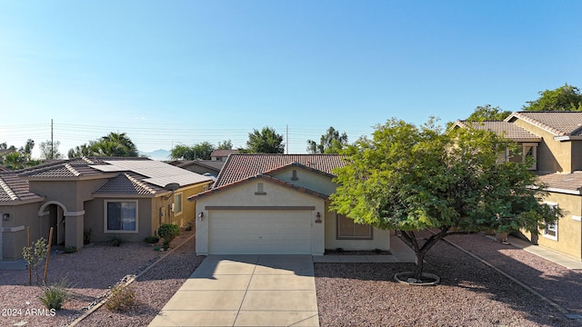 view of front of home featuring a garage