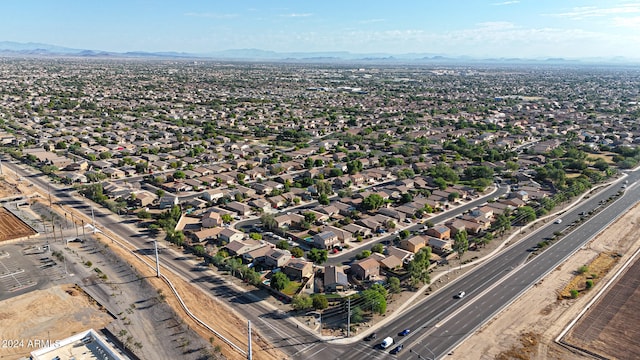 birds eye view of property featuring a mountain view