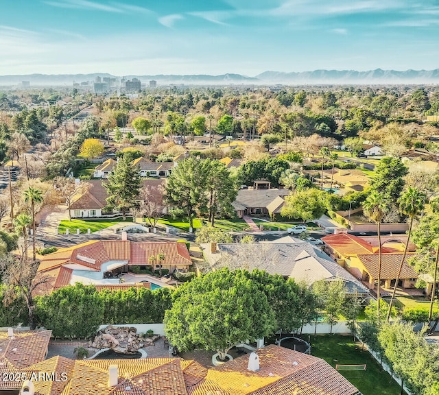 drone / aerial view featuring a mountain view