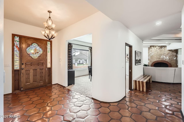 entrance foyer with a chandelier