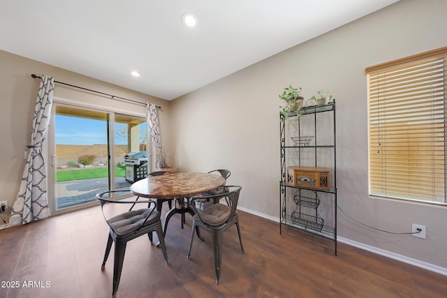 dining room featuring dark hardwood / wood-style flooring