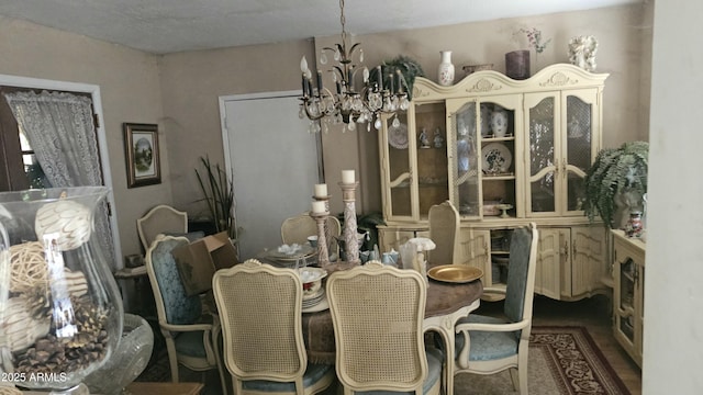 dining room featuring a notable chandelier