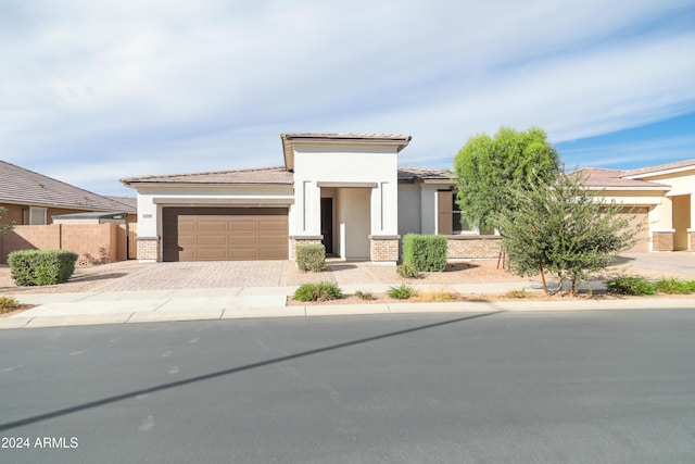 view of front of property featuring a garage