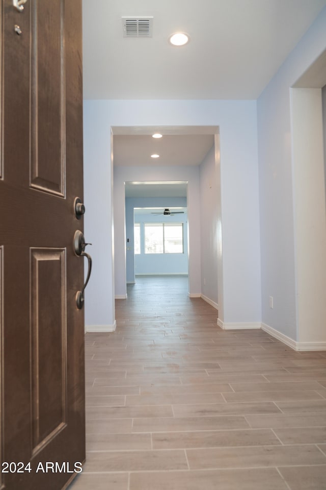 hall featuring light wood-type flooring