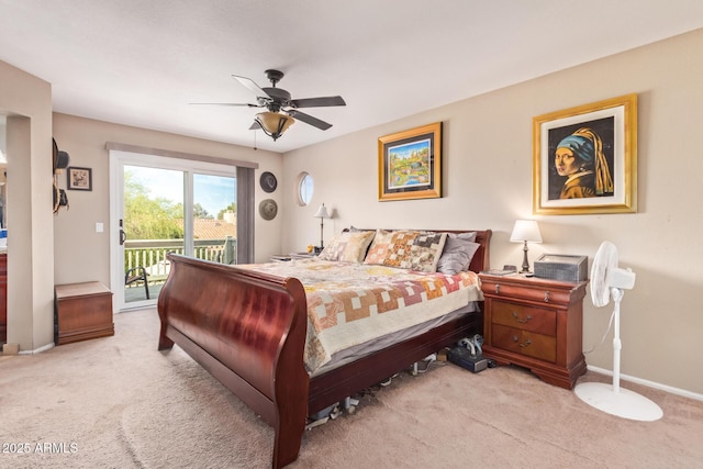 carpeted bedroom with access to outside and ceiling fan