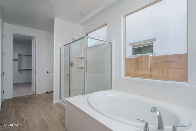 bathroom with independent shower and bath