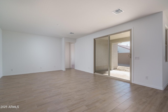 empty room featuring light wood-type flooring