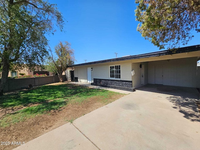 4520 N 28th Dr, Phoenix, AZ 85017 - view of front of property featuring a carport, driveway, and stone siding
