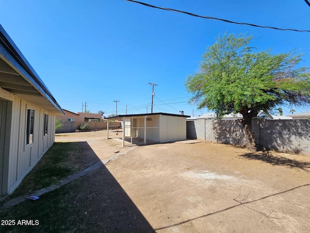 4520 N 28th Dr, Phoenix, AZ 85017 - fenced backyard with an outdoor structure