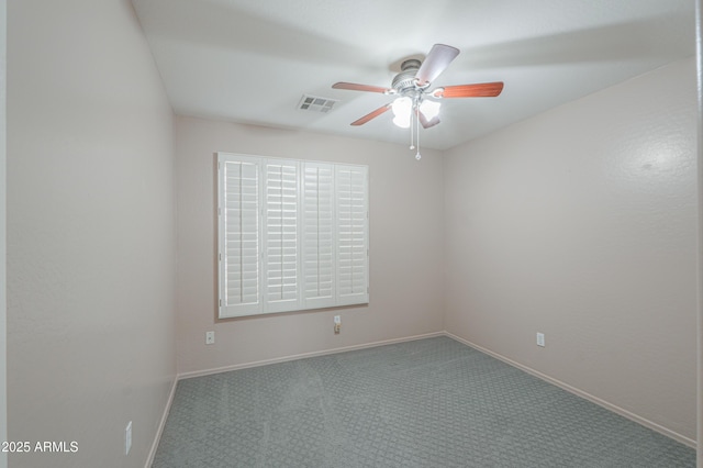 carpeted empty room with ceiling fan