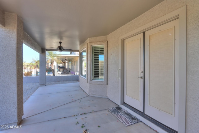 view of patio / terrace featuring ceiling fan