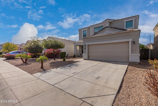 33242 N Jamie Ln, San Tan Valley, AZ 85144 - view of front of property featuring driveway, a garage, stucco siding, and a tile roof