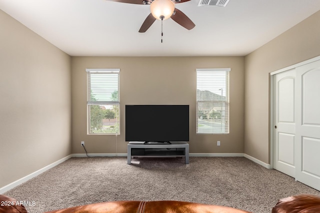 33242 N Jamie Ln, San Tan Valley, AZ 85144 - living room featuring carpet floors, plenty of natural light, and ceiling fan