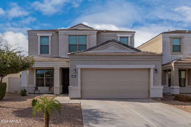 view of front of property with a garage