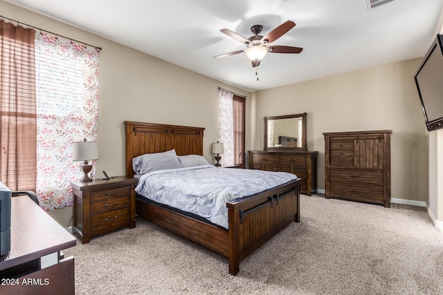 33242 N Jamie Ln, San Tan Valley, AZ 85144 - bedroom with light colored carpet and a ceiling fan