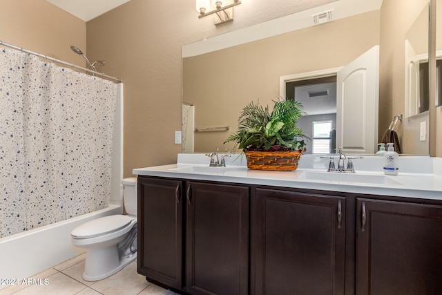 full bathroom featuring tile patterned floors, vanity, toilet, and shower / bathtub combination with curtain