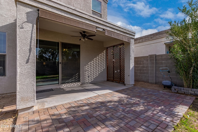 view of patio with ceiling fan