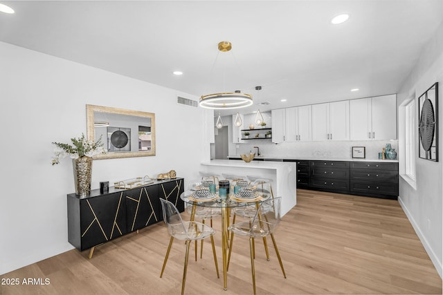 14635 N 37th Pl, Phoenix, AZ 85032 - dining area with light wood-style flooring, recessed lighting, and baseboards