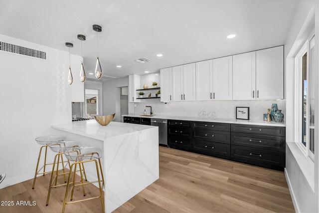 14635 N 37th Pl, Phoenix, AZ 85032 - kitchen featuring dark cabinetry, open shelves, white cabinetry, dishwasher, and a sink