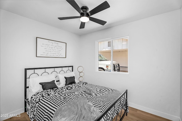 14635 N 37th Pl, Phoenix, AZ 85032 - bedroom with baseboards, wood finished floors, and ceiling fan