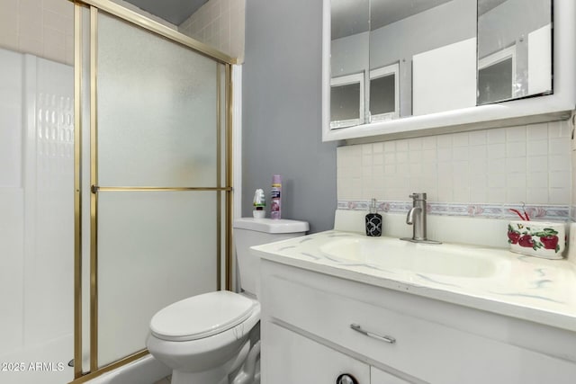 8623 W Indianola Ave, Phoenix, AZ 85037 - bathroom featuring decorative backsplash, a shower stall, and toilet