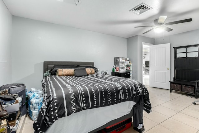 8623 W Indianola Ave, Phoenix, AZ 85037 - tiled bedroom featuring visible vents and a ceiling fan