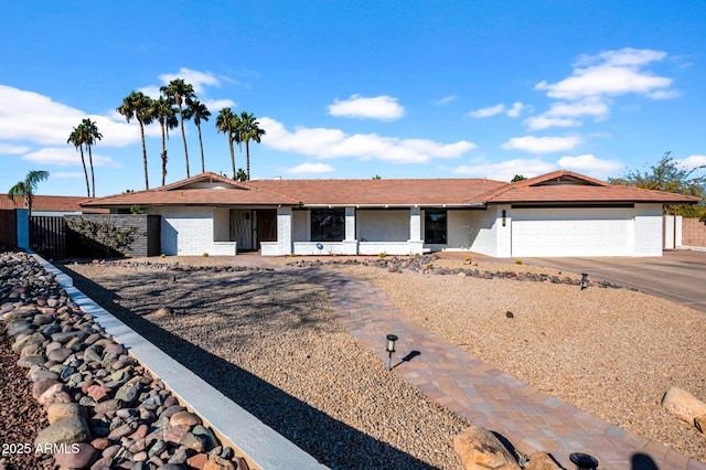 ranch-style home with a garage