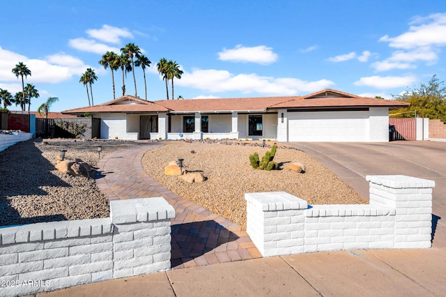 ranch-style home with a garage