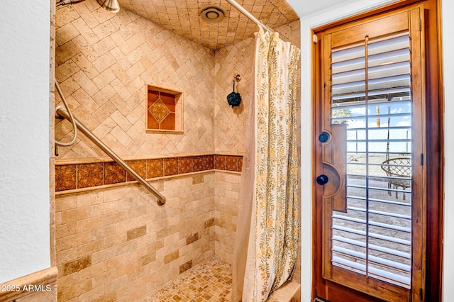 bathroom featuring walk in shower