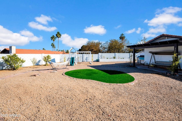 view of yard with a playground