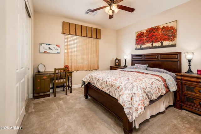 bedroom featuring light carpet, visible vents, baseboards, a ceiling fan, and a closet