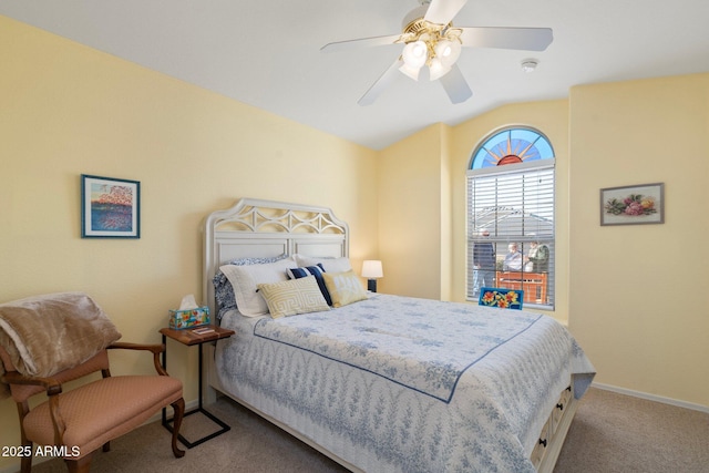 bedroom featuring lofted ceiling, carpet floors, and ceiling fan