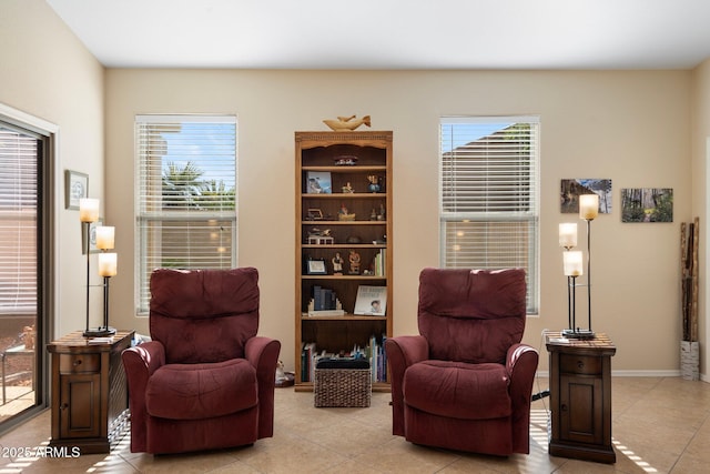 sitting room featuring light tile patterned flooring