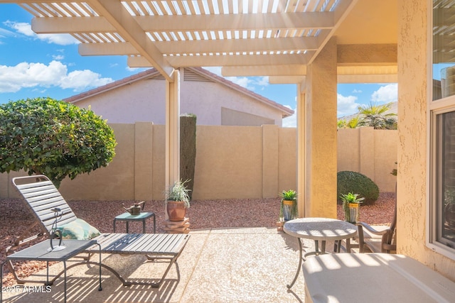 view of patio featuring a pergola