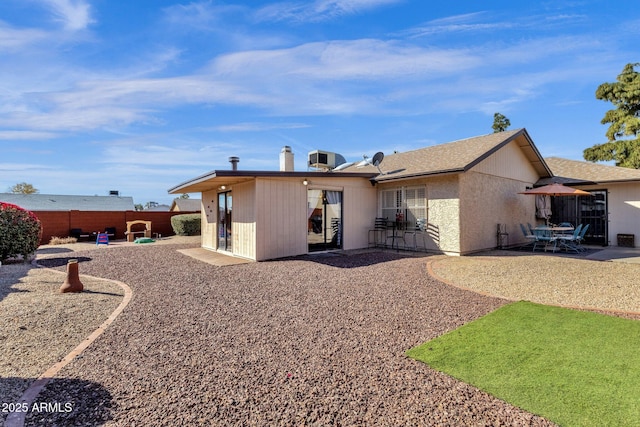 back of house featuring a patio area