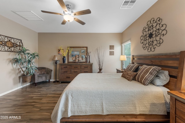 bedroom featuring ceiling fan and dark wood-type flooring