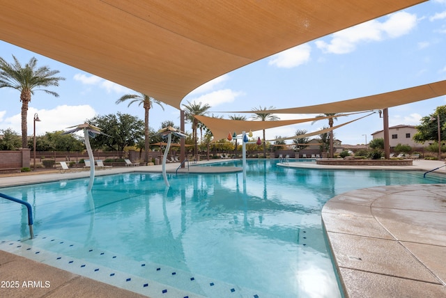 view of pool featuring a patio area