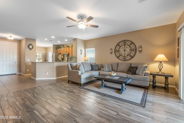 living room with ceiling fan