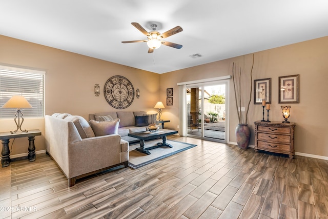 living room featuring ceiling fan